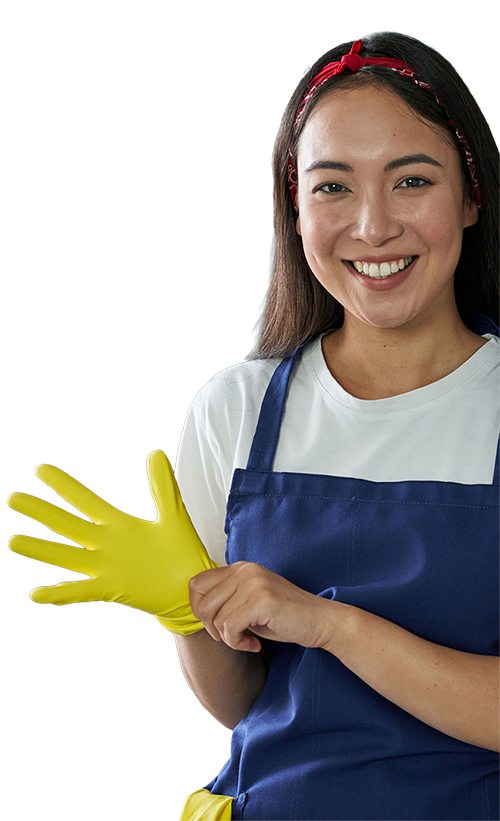 A smiling professional cleaner in tabard